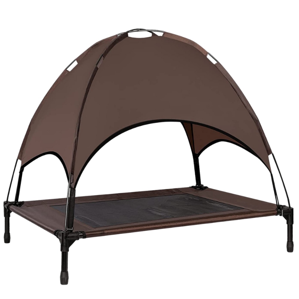 A raised pet bed with a fabric canopy over it